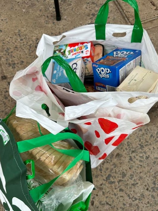 Sarah Burchell left with two bags of food. She estimates the food worth about $70. Picture: Supplied.