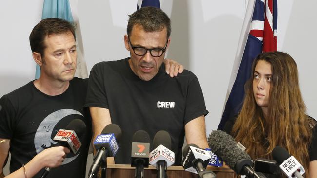 Laurent Hayez, father of missing Belgian backpacker Theo Hayez is supported by Theo’s godfather JP Hayez and cousing Lisa Hayez during a public appeal for information at Tweed Heads police station. Picture: AAP..