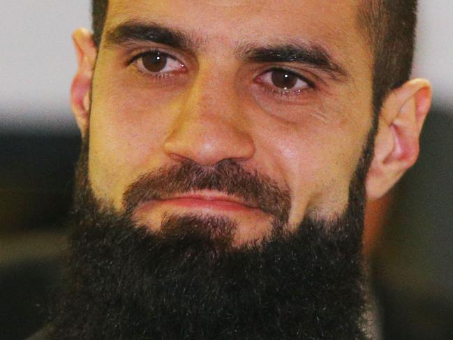 MELBOURNE, AUSTRALIA - JUNE 29:  Bachar Houli of the Richmond Tigers reacts after receiving a four week suspension at the AFL Appeals trial at AFL House on June 29, 2017 in Melbourne, Australia.  (Photo by Michael Dodge/Getty Images)