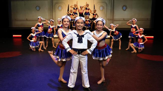 Young tap dancers Ibuki Joyce, 9, Tane Coleman, 11, and Isabelle Duffy, 9, will lead the junior tap class in 2 performances on Saturday. Photo: Brendan Radke