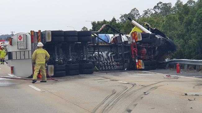 Police have declared an emergency situation following a fuel tanker rollover on the M1 at Helensvale.