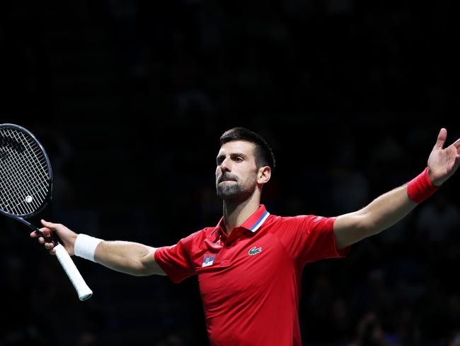 MALAGA, SPAIN - NOVEMBER 23: Novak Djokovic of Serbia celebrates winning match point during the Quarter-Final match against Cameron Norrie of Great Britain in the Davis Cup Final at Palacio de Deportes Jose Maria Martin Carpena on November 23, 2023 in Malaga, Spain. (Photo by Clive Brunskill/Getty Images for ITF)