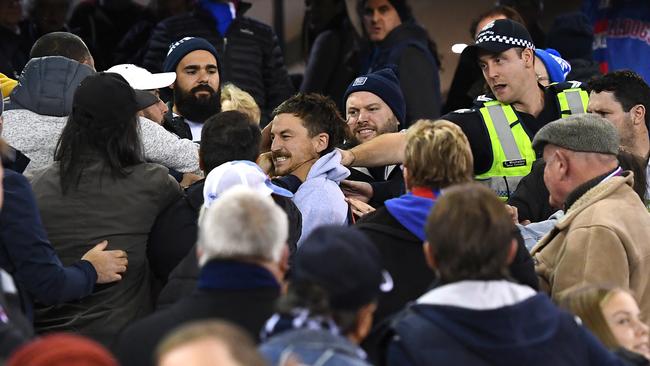 Officers were forced to intervene when a scuffle broke out. Picture: Quinn Rooney/Getty Images