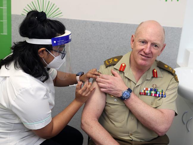 The co-ordinator general of Operation Covid Shield, Lieutenant General John Frewen, receives his vaccination booster dose in Canberra as Australia prepares to ease pandemic restrictions. Picture: Gary Ramage