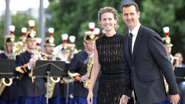 Assad and his wife Asma in Paris, 2008. Picture: Gerard Cerles/AFP Photo