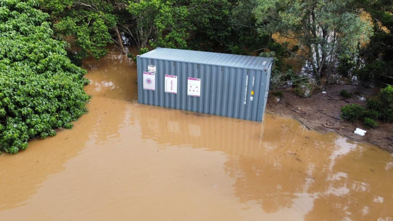 Colleen Miller said a shipping container filled with equipment was carried by the flood waters and washed into the gully near the courts. Photo: Facebook