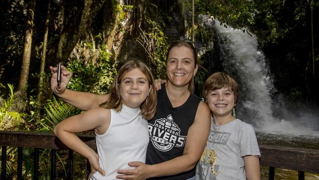 Marion Sawyers with her children Thea , 10, and Oscar, 12, checking out the waterfall at Curtis Falls in Tamborine National Park. Picture: Jerad Williams