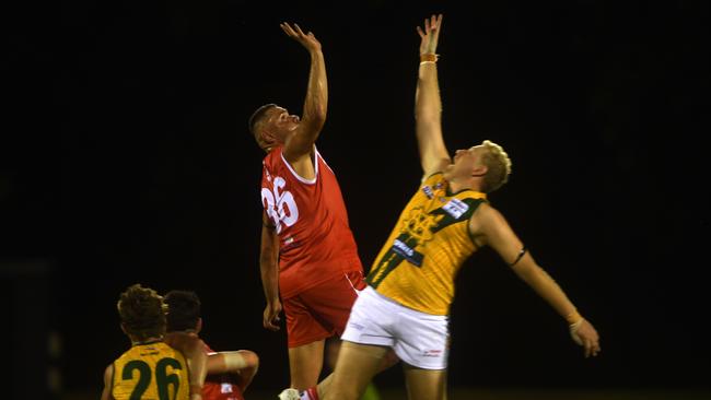 Waratah’s Arnold Kirby faces off with Ryan Smith of St Mary’s in the ruck. Picture: (A)manda Parkinson