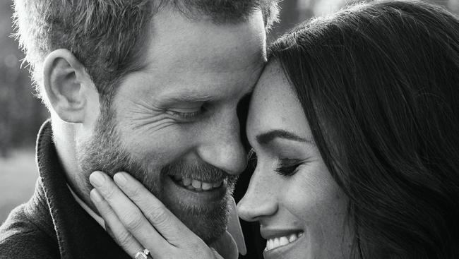 Prince Harry posing with his fiance Meghan Markle at Frogmore House in Windsor in one of two official engagement photos. Picture: AFP