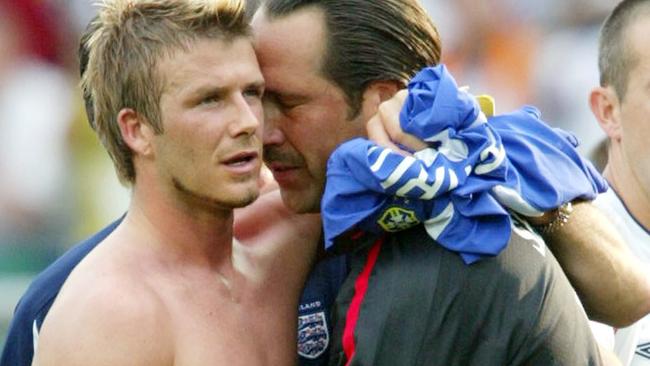 England captain David Beckham and David Seaman after their quarter-final loss to Brazil in 2002.