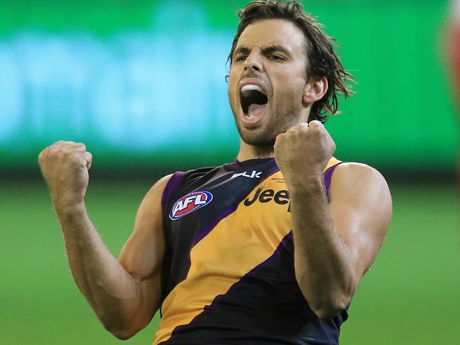 Sam Lloyd celebrates after kicking the winning goal after the siren against Sydney. Picture: Wayne Ludbey