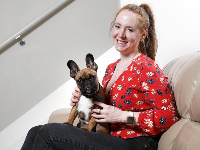 Kimberley Swaysland, pictured with Melvin the French Bulldog, will pocket an extra $20 a week in her savings. Picture: Image/Josh Woning