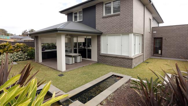 Kempsey 30 Display Home by Rawson Homes at Minto. Exterior Rear