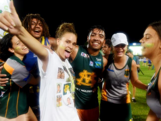 Shannon Rioli and fans celebrate St Mary's winning the 2015-16 NTFL Grand Final against Wanderers at TIO Stadium. Picture: Elise Derwin