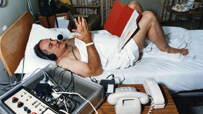 Bob Francis broadcasts from his hospital bed at the Burnside War Memorial Hospital after injuring his backt.