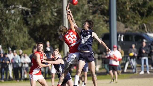 MPNFL: Sorrento’s Daniel Hughes and Zack O'Neill of Edithvale-Aspendale clash in the ruck. Picture: Valeriu Campan