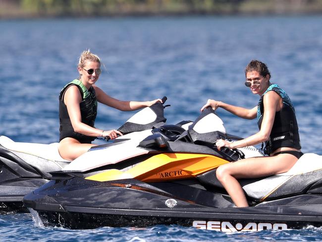 Jasmine Yarbrough, (left), pictured with a mystery brunette, is enjoying a holiday with Karl Stefanovic in Tahiti. Picture: BackGrid