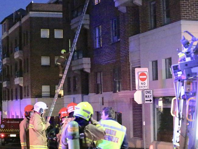 NSW Fire and Rescue at the apartment building which was evacuated due to a fire on the ground floor. Pictures: Steve Tyson