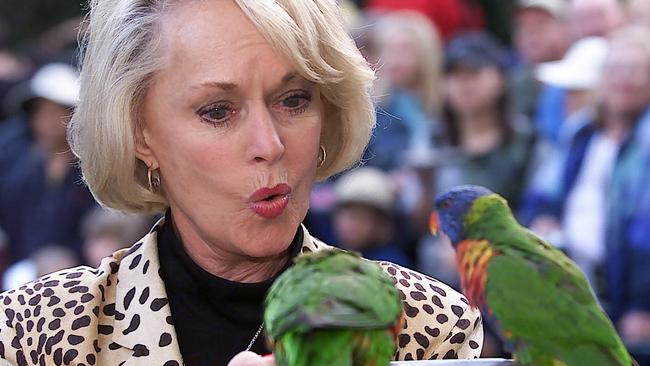 Actor Tippi Hedren feeding birds at Currumbin Wildlife Sanctuary