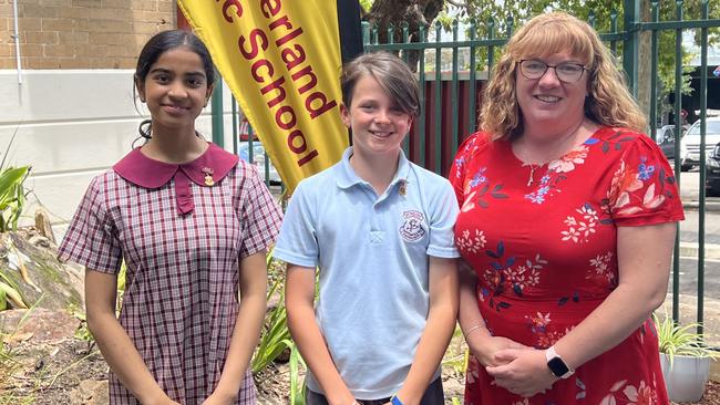 Sutherland Public School 2022 captains Elsha Sabapathy and Caleb Day, as well as the principal Leah Woolley.