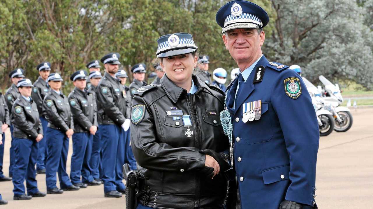 Awards for cops who saved campers from armed man | Daily Telegraph