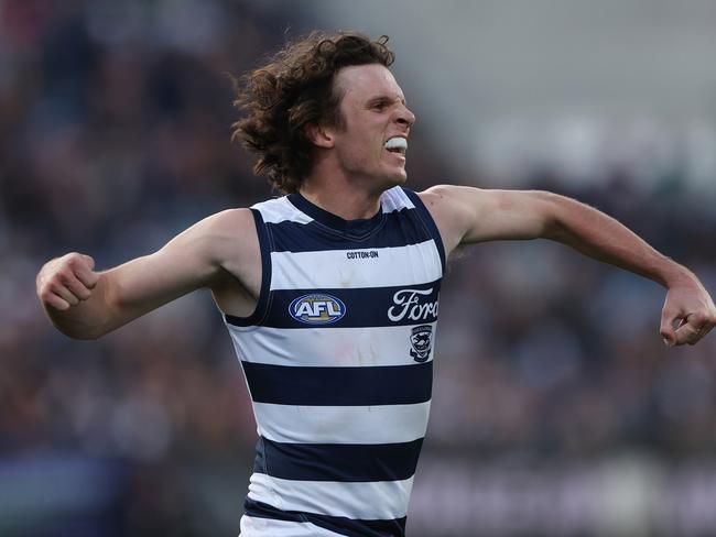 GEELONG, AUSTRALIA - MAY 06: Max Holmes of the Cats celebrates after scoring a goal during the round eight AFL match between Geelong Cats and Adelaide Crows at GMHBA Stadium, on May 06, 2023, in Geelong, Australia. (Photo by Robert Cianflone/Getty Images)