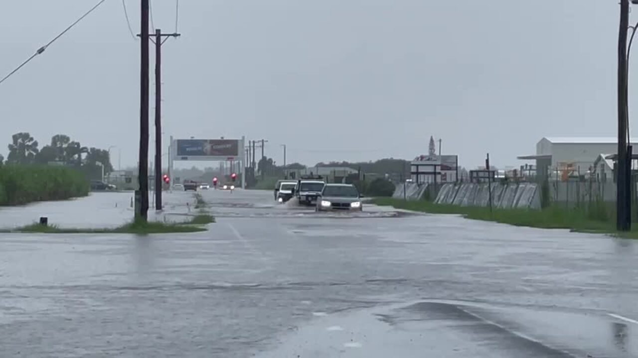 Mackay streets flooded, road to airport closed