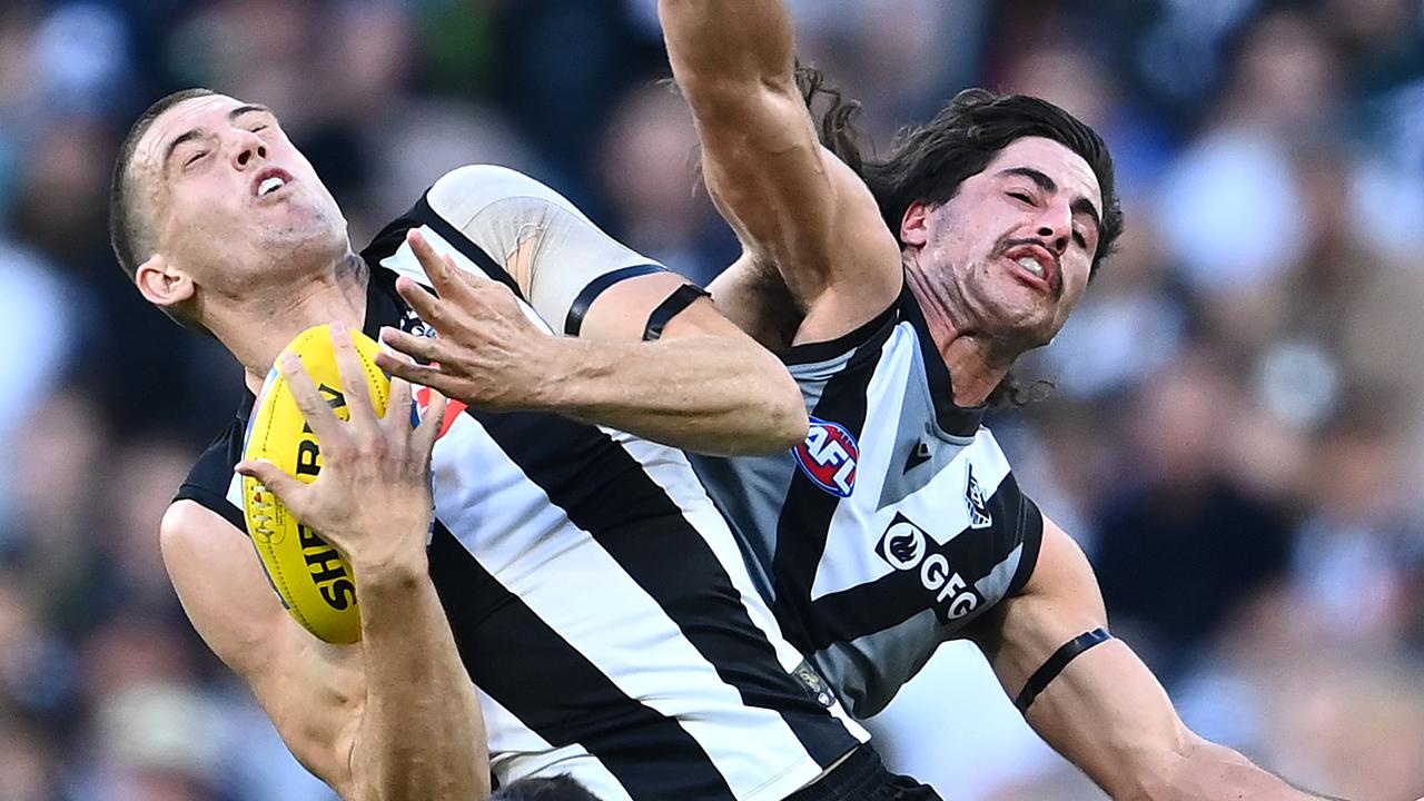 Darcy Cameron takes a strong mark in front of Lachlan Jones. Picture: Getty Images