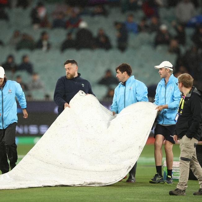 The covers come back on just before play was abandoned.