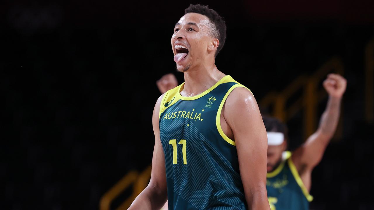 SAITAMA, JAPAN - AUGUST 07: Dante Exum #11 of Team Australia celebrates a win over Slovenia in the Men's Basketball Bronze medal game on day fifteen of the Tokyo 2020 Olympic Games at Saitama Super Arena on August 07, 2021 in Saitama, Japan. (Photo by Kevin C. Cox/Getty Images)