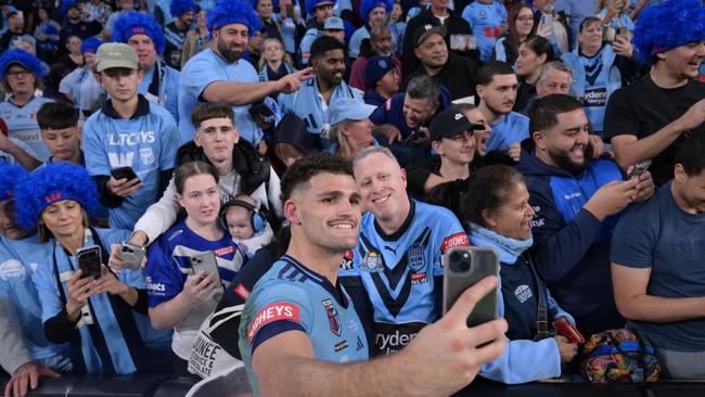 Winners are grinners: Nathan Cleary of the Blues takes a selfie with fans following the Blues’ decisive win. Picture: Getty Images