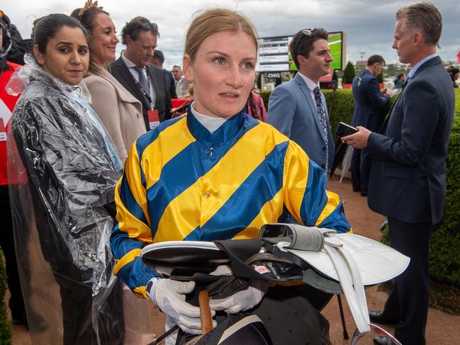 Cox Plate Day at Moonee Valley Racecourse.Race 5, the Australia Stakes won by  Sartorial Splendor ridden by Jamie Kah (yellow and navy diagonal stripes)   Picture Jay Town