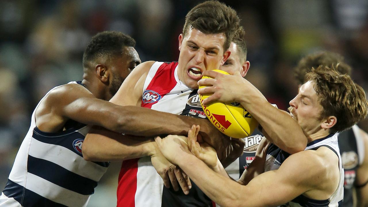 Rowan Marshall is set upon by Geelong opponents. Picture: Getty Images