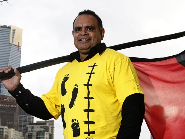 Michael Long leads The Long Walk from Birrarung Marr to the MCG today for the Dreamtime game between Essendon and Richmond.