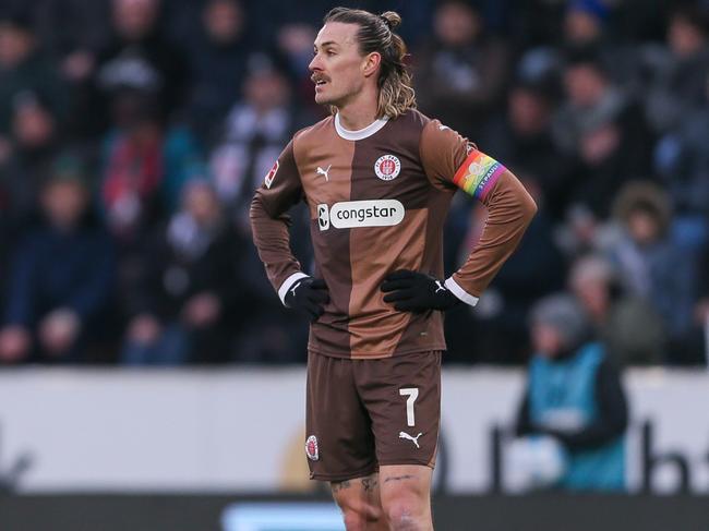 A dejected Jackson Irvine reflects on St Pauli’s 1-0 loss to Freiburg. Picture: Selim Sudheimer/Getty Images