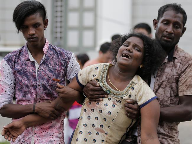 Relatives of a blast victim grieve outside a morgue in Colombo, Sri Lanka. More than 200 have been hundred were killed and hundreds more hospitalised. Picture: AP Photo