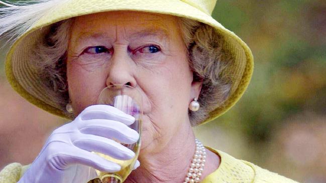 The Queen samples a Barossa wine while visiting Chateau Barossa in Adelaide in 2002. Picture: Russel Millard/News Limited Pool/AFP