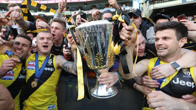 Dustin Martin and Trent Cotchin with the premiership cup. Picture: Alex Coppel