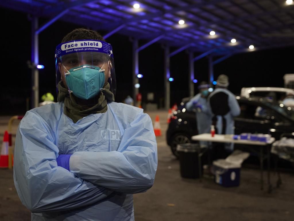 Medical officer Ahmed at the Fairfield Showgrounds Covid testing clinic. Picture: Brook Mitchell/Getty Images