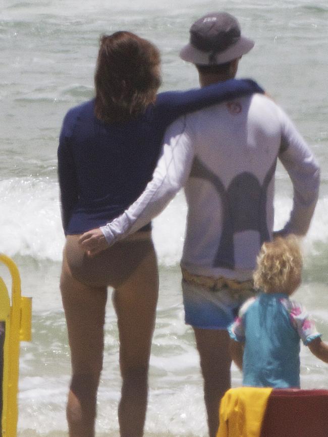 Princess Mary &amp; Prince Frederik watch as their children swim in the surf. Picture: INF