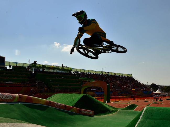 Australia's Sam Willoughby takes a practice run before the start of the men's BMX cycling seeding phase runs at the X-Park BMX venue in Deodoro during the Rio 2016 Olympic Games in Rio de Janeiro on August 17, 2016. / AFP PHOTO / CARL DE SOUZA