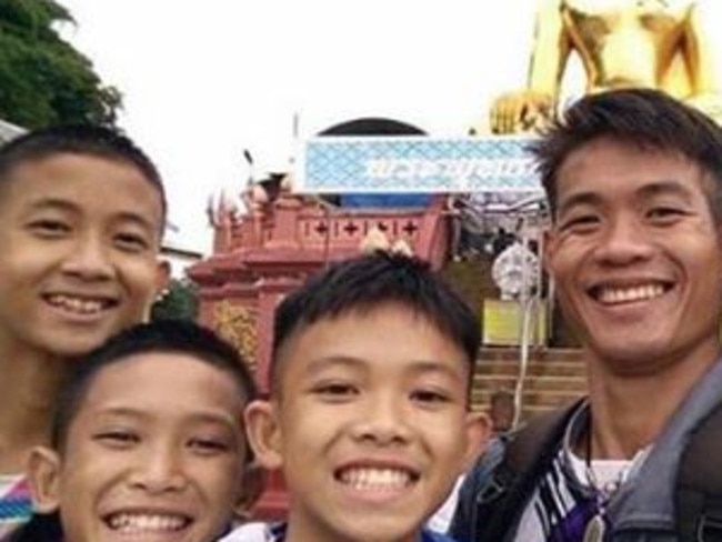 Coach Ekkapol Chantawong has fought malnutrition and exhaustion to keep caring for his beloved Wild Boar boys soccer team.