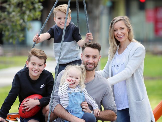 Former Carlton player Andrew Walker with his family Cody, 9, Arli, 5, and Leti, 2, and wife Kylie. Picture: Alex Coppel.