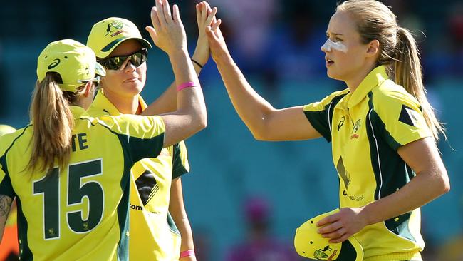 Ellyse Perry celebrates taking a wicket.