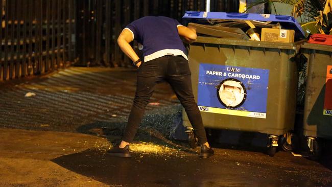 Pictured is a Bulldogs player vomiting on the street during the Bulldogs Mad Monday celebrations at the Harbour View Hotel at The Rocks. Picture: Christian Gilles