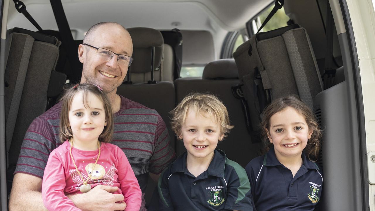 ELECTRIC CAR Electric car owner Sam Moloney and his kids, Jack, Tula and Jasmine. At Waterworks Reserve, Dynnyrne. Picture Eddie Safarik