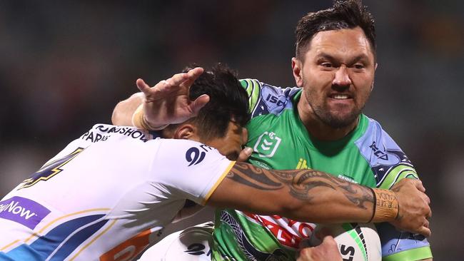 CANBERRA, AUSTRALIA - JULY 03: Jordan Rapana of the Raiders is tackled during the round 16 NRL match between the Canberra Raiders and the Gold Coast Titans at GIO Stadium, on July 03, 2021, in Canberra, Australia. (Photo by Mike Owen/Getty Images)