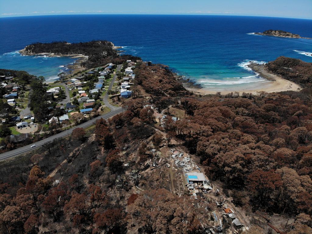 Homes in Malua Bay were randomly destroyed by the New Years Eve fire storm while others were left virtually untouched. A property off George Bass Drive in between Pretty Point and Mackenzies Beach was destroyed while homes along Illabunda Drive were left untouched. Picture: Toby Zerna