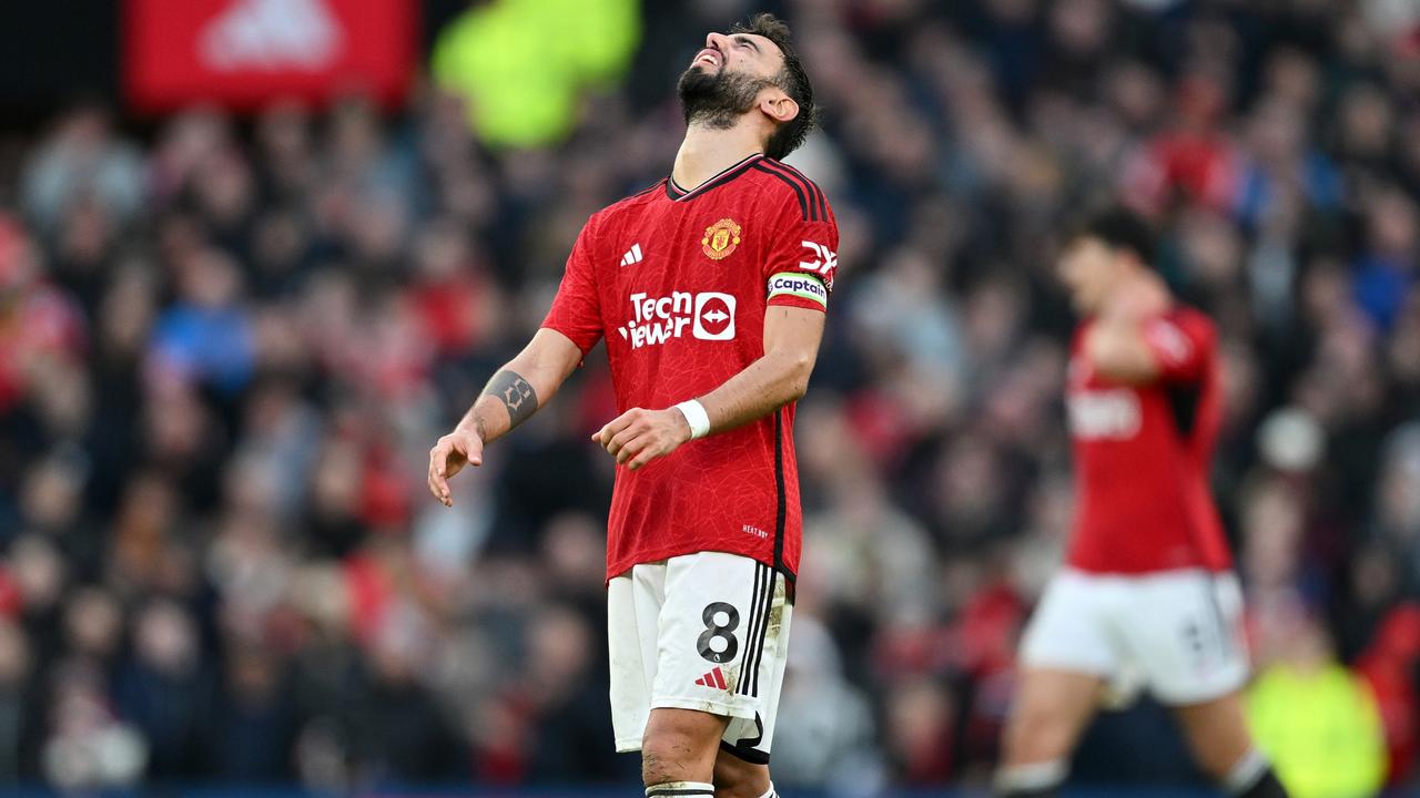 MANCHESTER, ENGLAND - FEBRUARY 24: Bruno Fernandes of Manchester United looks dejected during the Premier League match between Manchester United and Fulham FC at Old Trafford on February 24, 2024 in Manchester, England. (Photo by Michael Regan/Getty Images)