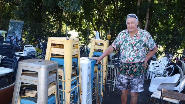 Retired builder Terry Downes inspects items at Tweed JUNKtion for restoration and resale.